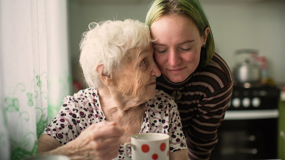 Elderly woman and granddaughter
