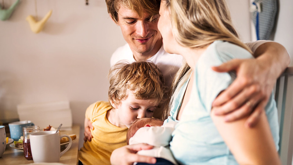 Content family having breakfast