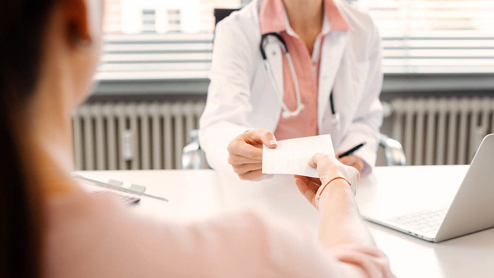 Newsroom Image - woman in GP surgery