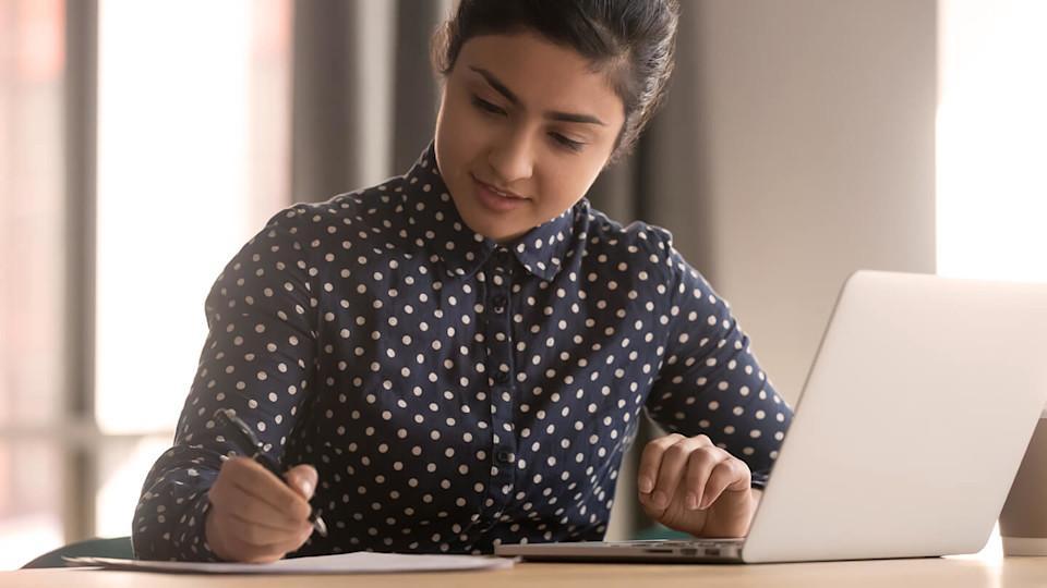 Young woman working at a table