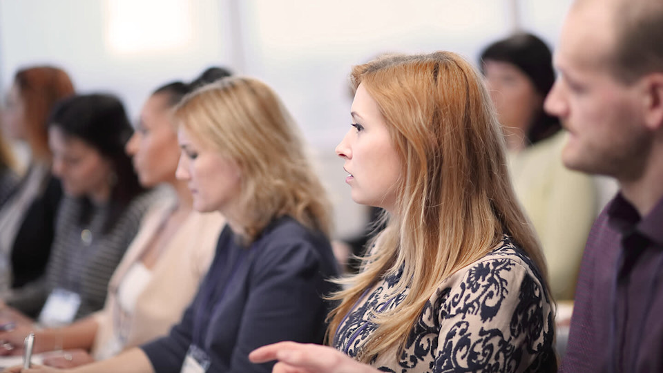 Woman concentrating in meeting