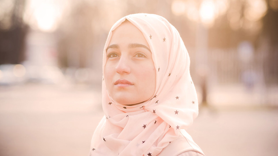 Woman in headscarf outside