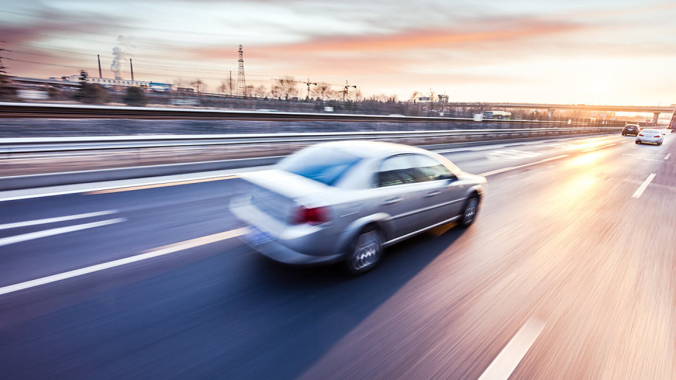 Blurred image of car moving at fast speed