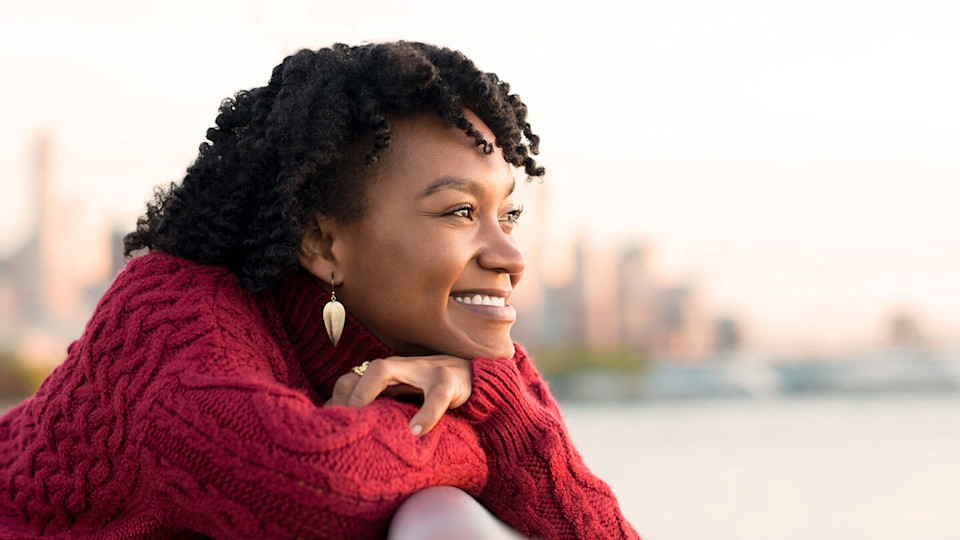 Happy woman staring into the distance