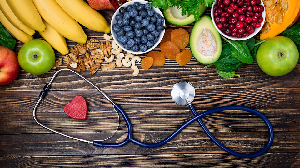 Doctors stethoscope in front of healthy diet