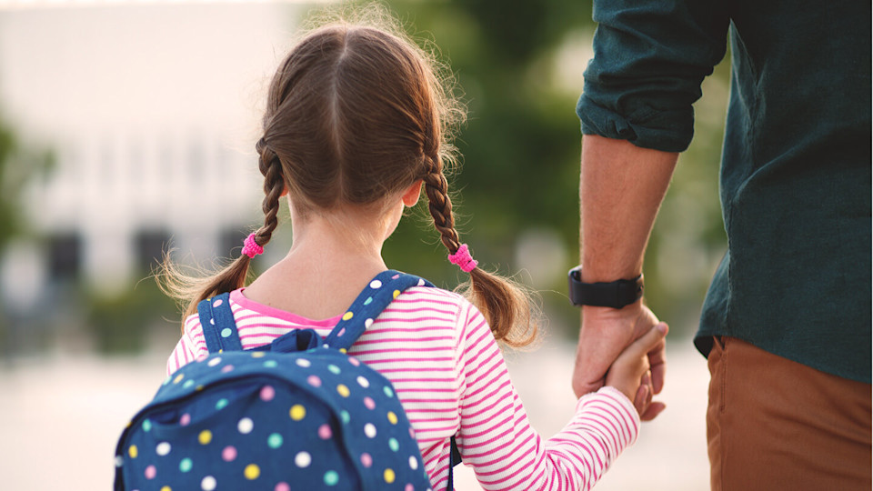 Newsroom - kid walking to school