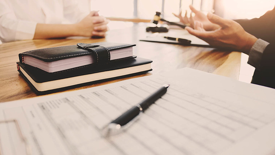 Newsroom Image - business meeting with paperwork on desk