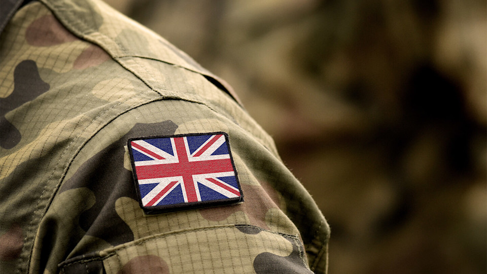 Military uniform with union jack badge on arm